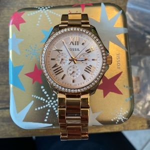 Woman’s fossil rose gold watch